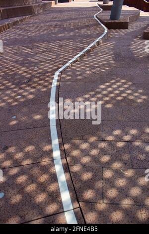 Interesting shadow on a wavy line. Stock Photo