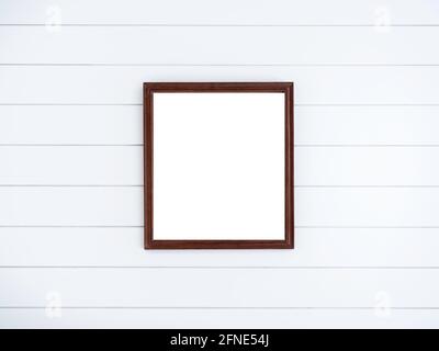 Blank brown square wooden picture frame on clean white wood plank wall background. Stock Photo