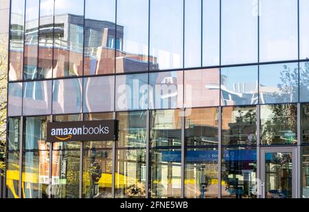 Denver, Colorado - May 12, 2021: Amazon Books physical retail location building sign on the bookstore glass façade in Cherry Creek district, Denver, C Stock Photo