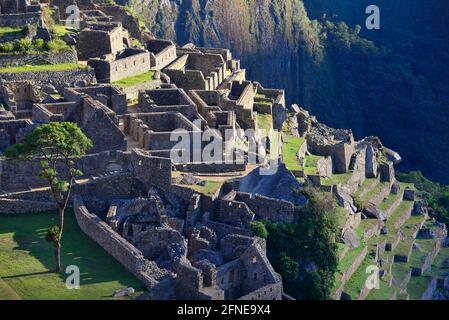 Inca ruined city at sunrise, Machu Picchu, Urubamba province, Peru Stock Photo