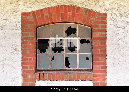 Muntin window with broken glass of old abandoned building Stock Photo ...