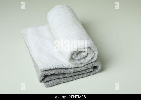 Clean folded towels on white background, close up Stock Photo