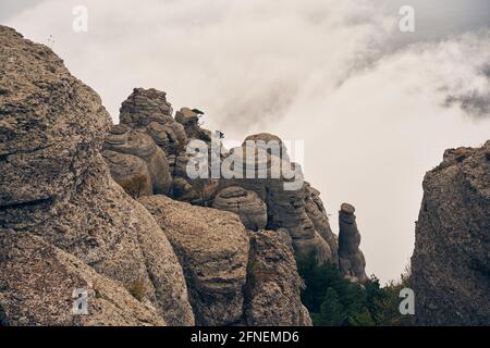 Grand stone pillars on the slopes of Mount Demerdzhi. Valley of ghosts, Crimean Mountains. Natural landscape Stock Photo