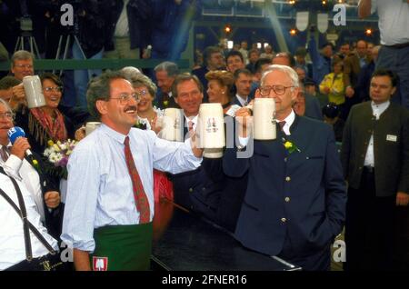 Mayor Christian Ude toasts with Prime Minister Edmund Stoiber at the Oktoberfest in Munich in 1999: 'Ozapft is'. [automated translation] Stock Photo