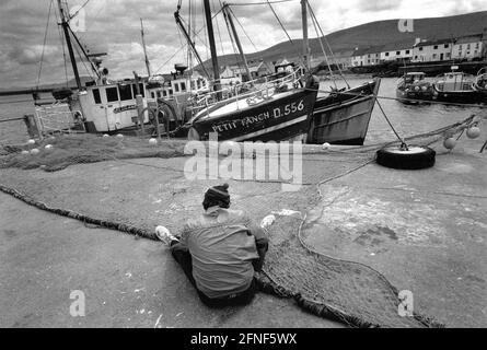 Fishermans Mending Nets. Burgundy, Black, White, Gray Stock Image