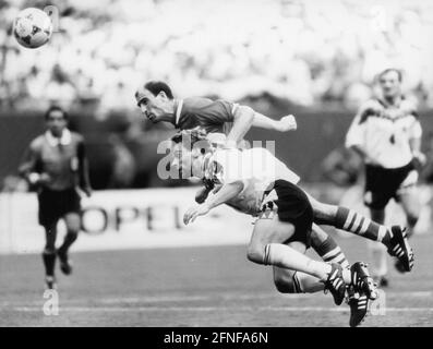 Date of recording: 10.07.1994 At the World Cup in the USA, Bulgarian player Iordan Letchkov heads past Thomas Häßler to make it 2:1, which meant the end for the German team. [automated translation] Stock Photo