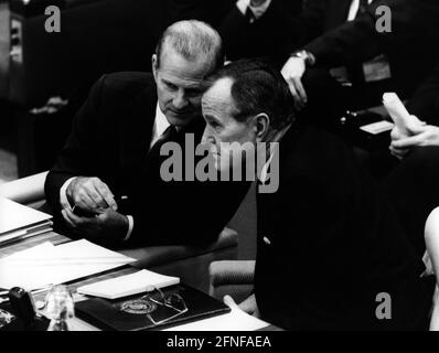 United States Secretary of State James Baker (left) with U.S. President George Herbert Walker Bush at a NATO summit in Brussels, December 5, 1989. [automated translation] Stock Photo
