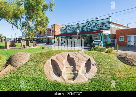 Sculpture of a dinosaur footprint, a tourist attraction in the main street of Winton, Central Queensland, QLD, Australia. Stock Photo