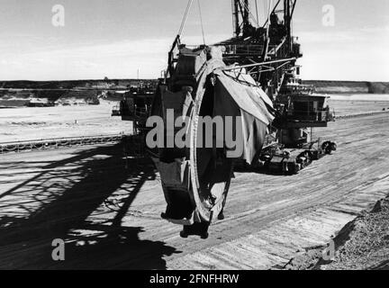 A bucket wheel excavator in the Garzweiler open pit mine near Mönchengladbach. The mining area in the background. [automated translation] Stock Photo