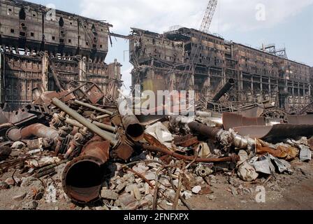 Brandenburg / GDR / Industry 1992 End of the GDR. The large Lauchhammer coking plant is demolished. Coke was made there from brown coal. The photo symbolizes the dismantling of the GDR economy. Great environmental damage must be removed // Treuhand / Demolition / Economy / Federal States During the Cold War, the GDR could not get coke for its steelworks from the West. It had to produce it from brown coal. The coking plant was supplied by 7 open-cast lignite mines. After the reunification, the basis for the unprofitable operation was gone. The plant was demolished, the contaminated soil was Stock Photo