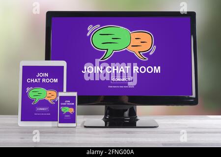 Chat room concept shown on different information technology devices Stock Photo