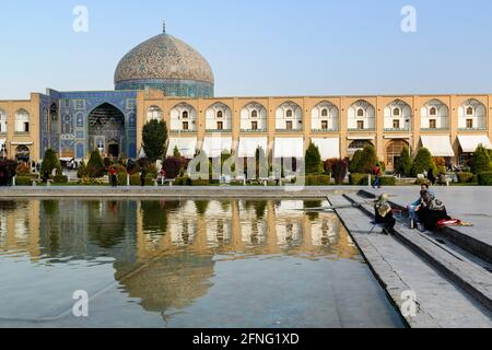 View from the pond in the center of the Naqsh-e Jahan square of the Sheikh Lotfollah mosque. Isfahan, Iran. Stock Photo