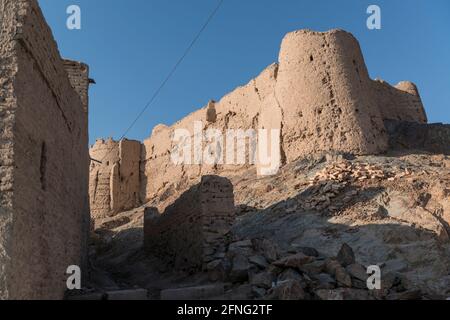 The ruins of the citadel of Mohammadieh on top of a hill, near the town Stock Photo