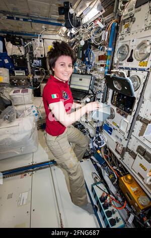 ABOARD THE INTERNATIONAL SPACE STATION - 12 June 2015 - ESA (European Space Agency) astronaut Samantha Cristoforetti prepares the TripleLux-A experime Stock Photo