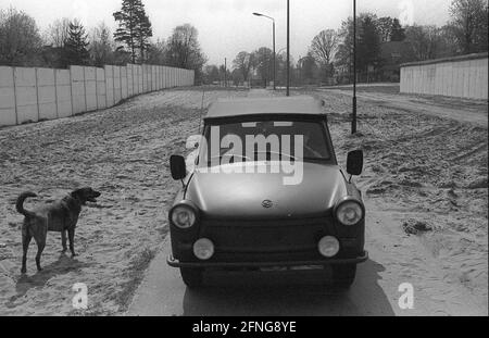 GDR, Berlin, 22, 04.1990, border strip between the walls near Frohnau, Trabant with border guards, dog, [automated translation] Stock Photo