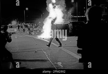 Germany, Berlin, 03.10.1990, Alexanderplatz, autonomous demonstration in East Berlin on the occasion of the day of the reunification on 3 October 1990, burning car, [automated translation] Stock Photo
