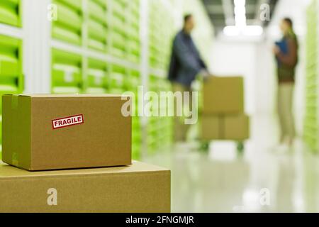 Close-up of parcel in cardboard box in the warehouse Stock Photo