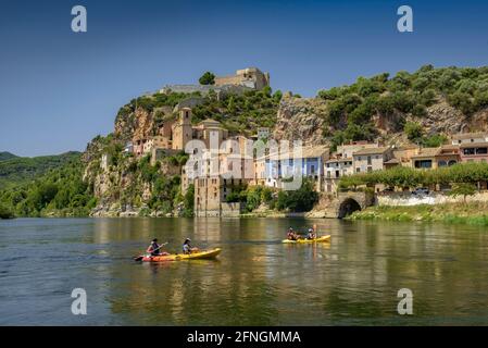 Miravet village and castle seen from the jetty on the Ebro river (Ribera d'Ebre, Tarragona, Catalonia, Spain) Stock Photo