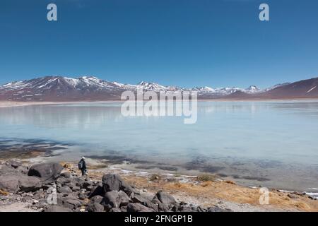 The impressive Laguna Verde on the border of Chile and Bolivia. Accessed by desert tracks, usually as part of an overland safari group Stock Photo