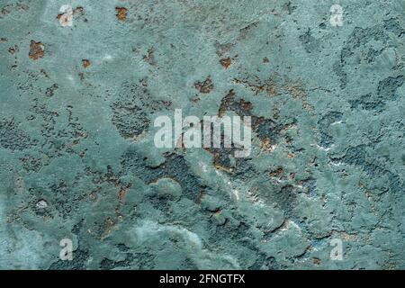 Abstract ocean blue clay wall texture background with imperfections and cracks. Stock Photo