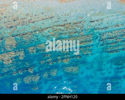 Aerial view of sea surface with coastline Stock Photo