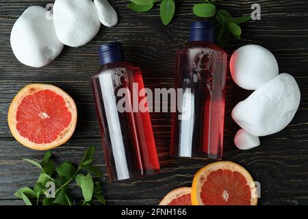 Natural shower gel and ingredients on wooden background Stock Photo