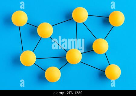 Balls connected to each other representing a molecular structure. Science and molecules concept. Stock Photo