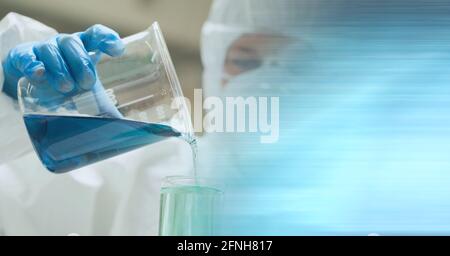 Composition of female scientist in lab using beaker with motion blur Stock Photo