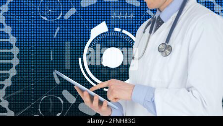 Composition of caucasian male doctor with tablet over digital interface with medical icons Stock Photo