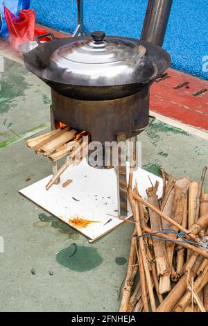 Chinese traditional wood stove, firewood for cooking Stock Photo - Alamy
