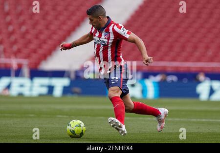 Madrid, Spain. 16th May, 2021. Luis Suarez (Atletico de Madrid) in action during the La Liga match round 36 between Atletico Madrid and CA Osasuna at Wanda Metropolitano Stadium.Sporting stadiums around Spain remain under strict restrictions due to the Coronavirus Pandemic as Government social distancing laws prohibit fans inside venues resulting in games being played behind closed doors. Final score; Atletico Madrid 2:1 CA Osasuna. Credit: SOPA Images Limited/Alamy Live News Stock Photo