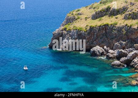 Zingaro Nature Reserve, Trapani, Sicily, Italy. View over the turquoise waters of Cala Capreria from coastal path above the Gulf of Castellammare. Stock Photo