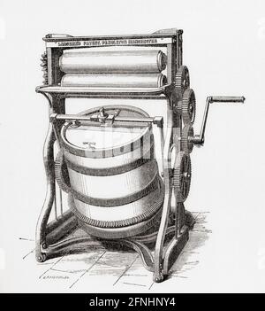 A compund rotary washing machine with rollers for wringing or mangling, designed by Richard Lansdale.  From A Concise History of The International Exhibition of 1862, published 1862. Stock Photo