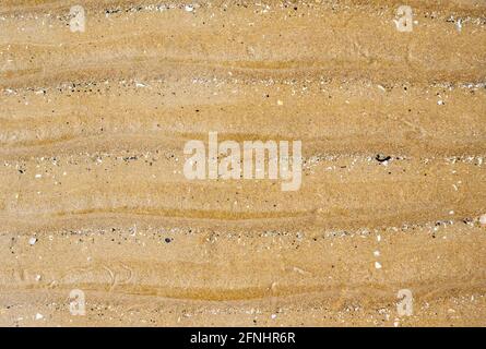 Ridge patterns on a sandy beach at St Annes, Lancashire, UK, caused by wave motion Stock Photo