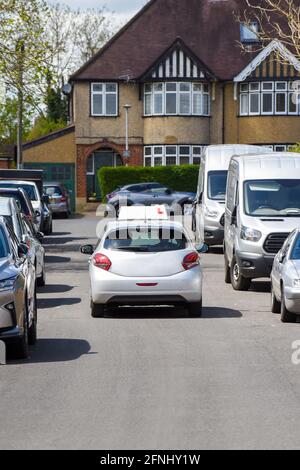 Learner driving having driving lesson to learn to drive on public roads Stock Photo