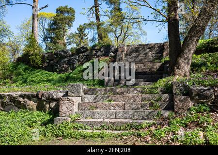 Stone steps to empty lot where Villa Solhem (1893-1974) once stood in Meilahti district of Helsinki, Finland Stock Photo