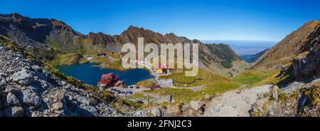 Outstanding panoramic view of Balea Lake, famous Transfagarasan road, Fagaras Mountains, Sibiu County, Romania Stock Photo