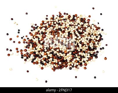 handful of tricolour quinoa seeds mix closeup on white background Stock Photo