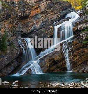 Cameron Falls in Waterton Lakes National Park exposes some of the oldest rock in the Canadian Rocky Mountains. It is the most photographed scenic spot Stock Photo