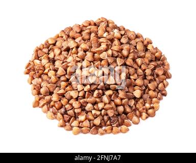 pile of roasted buckwheat grains closeup on white background Stock Photo