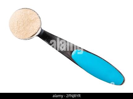 top view of apple pectin powder in measuring spoon cutout on white background Stock Photo