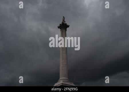 London, UK. 17th May, 2021. Dark clouds gather over Trafalgar Square moments before a thunderstorm in London. Credit: SOPA Images Limited/Alamy Live News Stock Photo