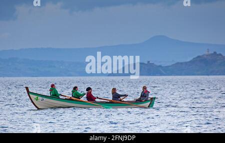 Portobello, Edinburgh, Scotland. UK. 17th May 2021. With Covid-19 restrictions opening up in Scotland the RowPorty Coastal Rowing Club members can get out on the Firth of Forth, first time since last August. Credit: Arch White/Alamy Live News Stock Photo
