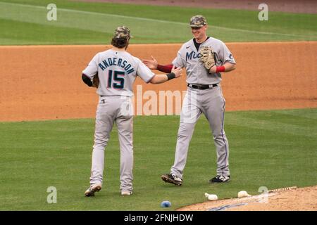 Miami Marlins first baseman Garrett Cooper (26) returns to the dugout  during a baseball game against the St. Louis Cardinals, Thursday, July 6,  2023, in Miami. (AP Photo/Marta Lavandier Stock Photo - Alamy