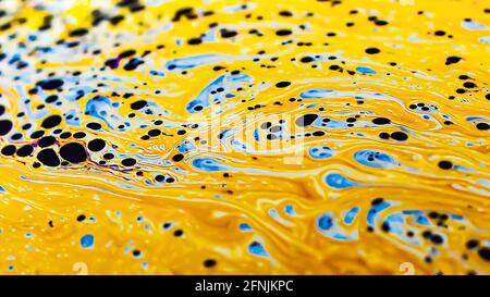 Beautiful psychedelic abstractions on the surface soap bubbles. Stock Photo
