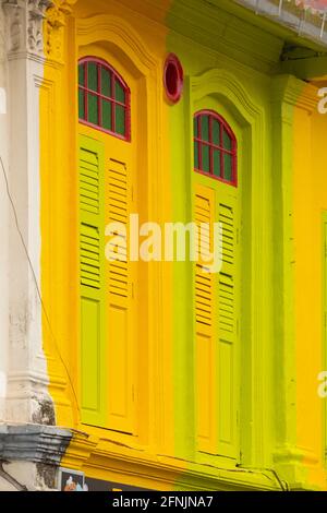 Brightly painted windows on the facades of buildings in Little India and China town, near Rochor, in Singapore, Southeast Asia. Beautiful example of c Stock Photo