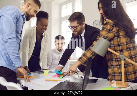 Diverse interracial creative business team briefing idea and brainstorming Stock Photo
