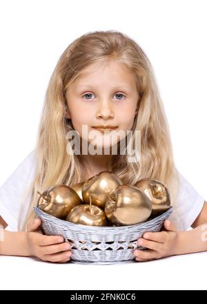 Blonde girl with golden lips in front of a silver basket with golden apples. Bible concept for: A word fitly spoken is like apples of gold in pictures Stock Photo