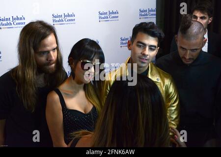 October 24, 2015, Beverly Hills, California, USA: Jack Lawless, Joe Jonas, JinJoo Lee and Cole Whittle of ''DNCE'' attends the 2015 Ceritas Gala Honoring Raylene Meyer and Bruce Meyer, Merle and Peter Mullin and Wendy Goldstein at the Beverly Wilshire Hotel in Beverly Hills California om October 24, 2015. (Credit Image: © Billy Bennight/ZUMA Wire) Stock Photo