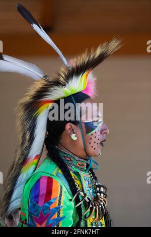 Closeup of male indigenous dancer with face paint in Elbow River Camp, a First Nations display which is part of the Calgary Stampede Stock Photo